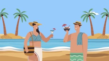 Çift sahilde kokteyl içiyor.