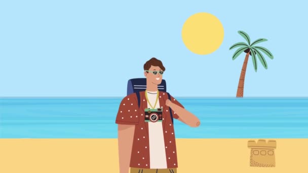 Jonge man met camera fotografische op het strand — Stockvideo