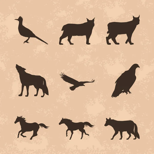 Nove animais silhuetas ícones — Vetor de Stock