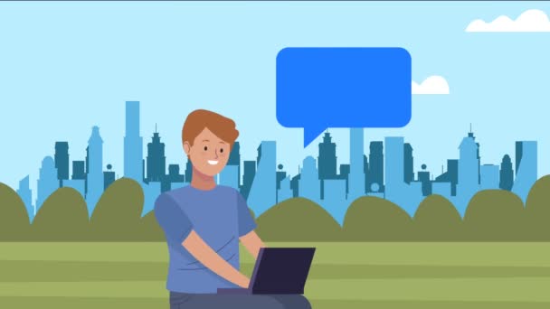 Fiatal férfi ül a laptop és beszéd buborék — Stock videók