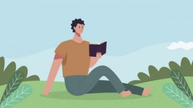 Kampta kitap okuyan genç bir öğrenci.