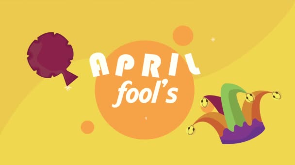 April dwazen dag belettering met scheetzak en joker hoed — Stockvideo