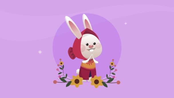 Veselá velikonoční oslava s králíkem v květinovém rámečku — Stock video