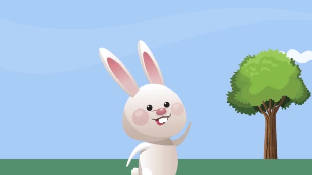 Feliz fiesta de Pascua con conejo en el paisaje — Vídeos de Stock