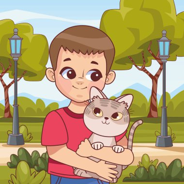 Parkta kediyi kaldıran çocuk.