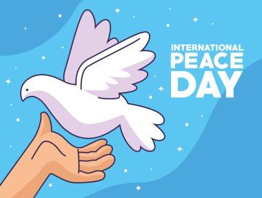 peace day lettering with hand and dove