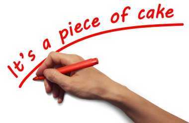 Kırmızı kalemli bir el kırmızıyla bir yazı yazar.