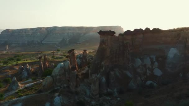 Amazing aerial background of big tall rocks, incredible clear sunny desert panorama, sunrise sky in Cappadocia Turkey. — Video Stock