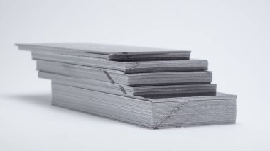 stack of business cards on a white background.