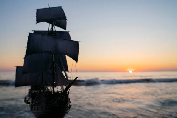 vintage pirate sailing ship at sea