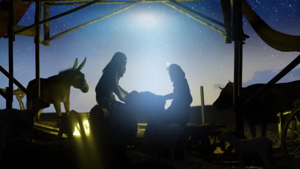 Рождественская Сцена Младенца Иисуса Сцена Младенца Иисуса Яслях Силуэтами Марии — стоковое видео