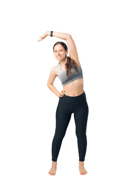 Smiling Camera Young Woman Making Some Stretching Exercises Full Length — Stock Photo, Image