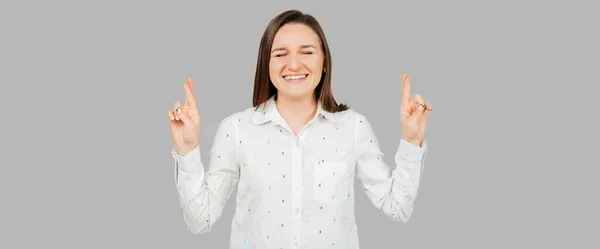 Riendo Joven Estudiante Está Deseando Cruzando Los Dedos Estudio Sobre — Foto de Stock