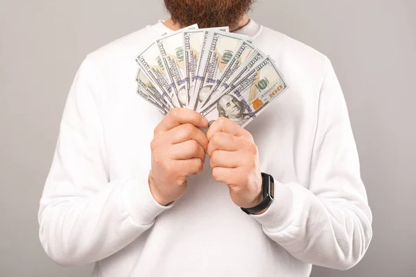 Face Photo Man Holding Bunch Money Front His Chest Studio — Stock Photo, Image