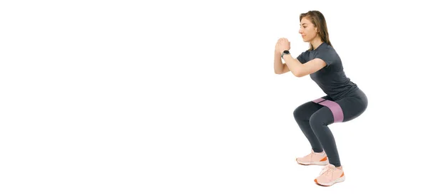 Banner Photo Fit Young Woman Making Squats Using Elastic Band — Stock Photo, Image