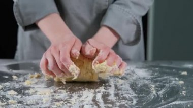 Close up footage of chef preparing dough for pasta