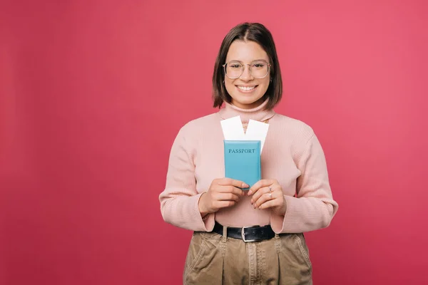 Ecstatic Young Woman Holding Blue Passport While Smiling Camera Studio — Fotografia de Stock