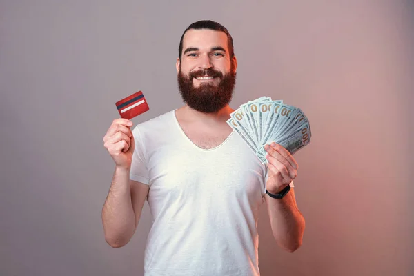 Hard Choose Cash Card Bearded Man Smiling Holding Both Studio — Stock Photo, Image