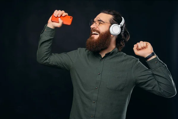 Young Bearded Man Dancing Singing Happily While Listening Music — Foto de Stock