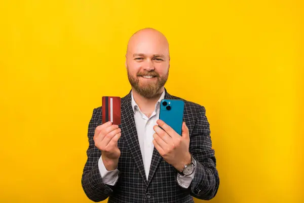 Picture Businessman Holding Credit Card His Phone While Smiling Camera — Foto de Stock