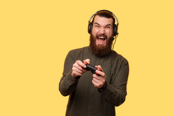 Picture Young Bearded Gamer Playing His New Console — Stok fotoğraf