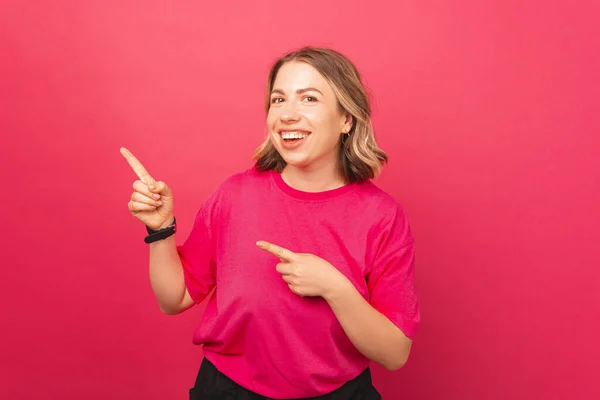 Exciting Happy Woman Pointing Free Space Pink Background — Foto de Stock