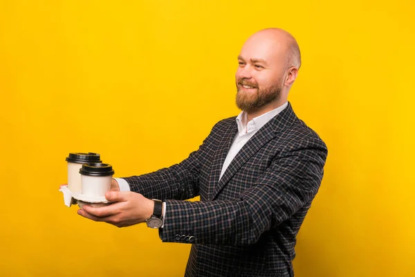 Business Man Giving Two Cups Coffee Smiilng — Foto de Stock