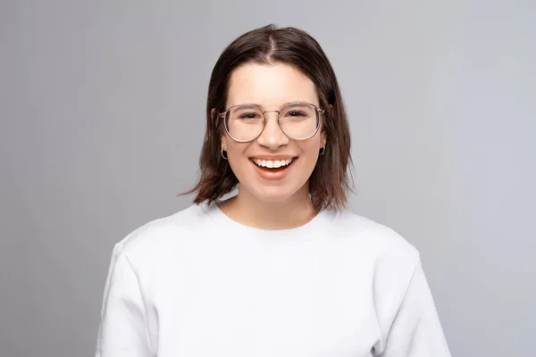 Ecstatic Young Lady Wearing Glasses White Sweatshirt Smiling Wide While — Foto de Stock