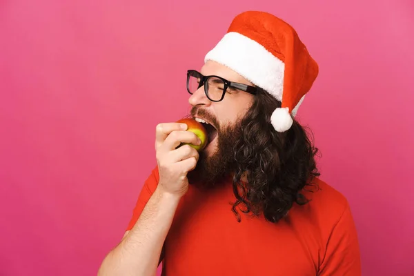 Curly Long Haired Man Wearing Christmas Hat Eats Healthy Tasty — Stock Photo, Image