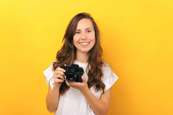 Close Portrait Young Woman Holding Vintage Photo Camera Yellow Background — Stock Photo, Image