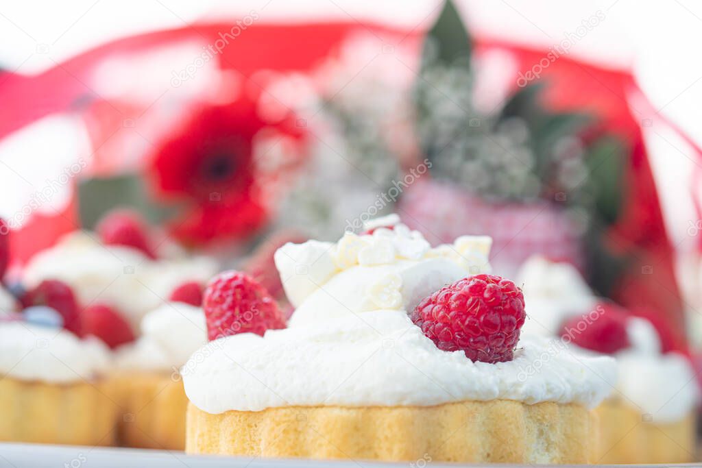 Raspberry biscuit and cream dessert, sweet dessert with raspberries, cake, brownie