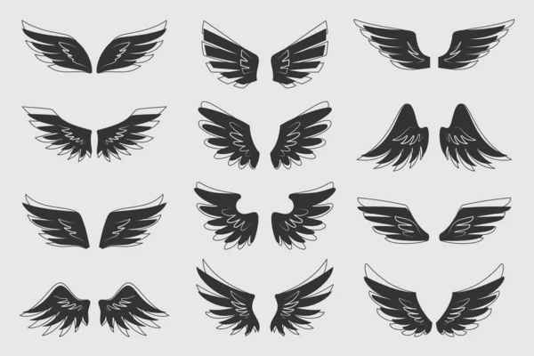 Ala volar ángel pájaro negro tatuaje heráldico icono conjunto — Archivo Imágenes Vectoriales