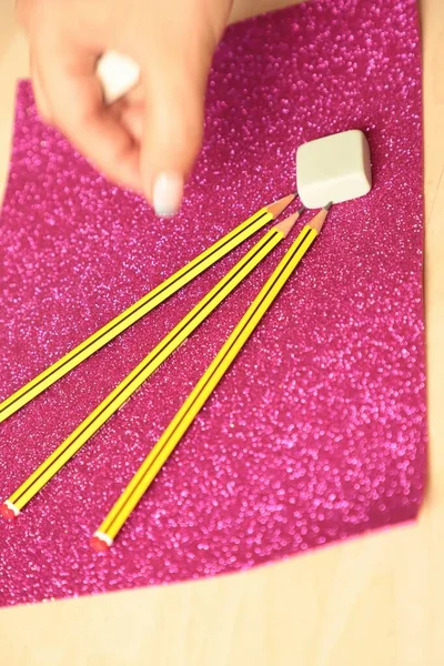 Close Hand Holding Chopsticks Pink Background — Stockfoto
