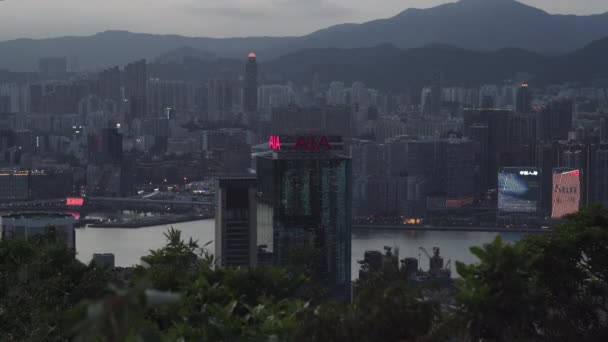 HONG KONG Lampeggiante pubblicità luci su edifici della città locale — Video Stock