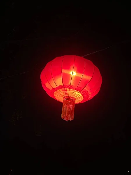 red hot air balloon in the night sky