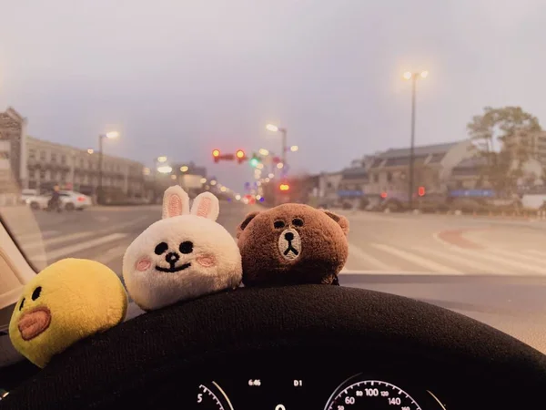 teddy bear in the car