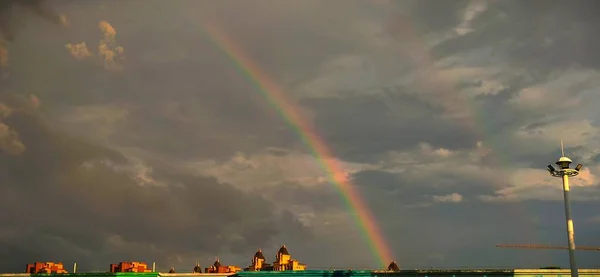 rainbow sky with clouds and blue skies