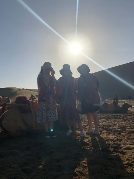 group of people in the desert