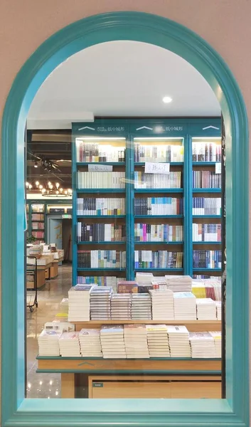 library interior with books and bookshelf