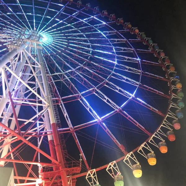 ferris wheel in amusement park, london, usa