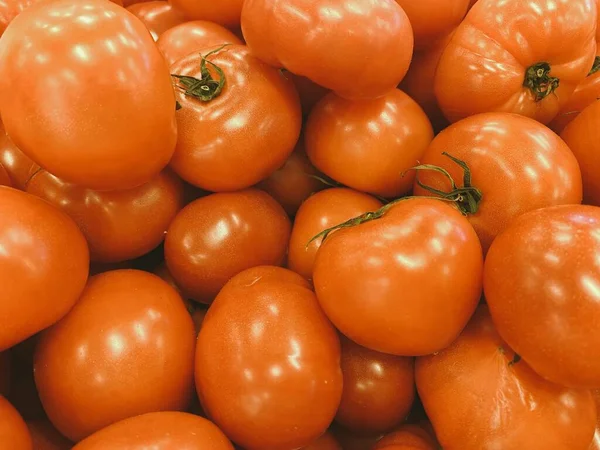 fresh ripe tomatoes on a white background