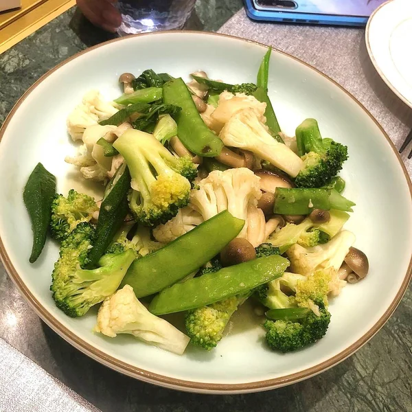 stock image green asparagus with broccoli and spinach