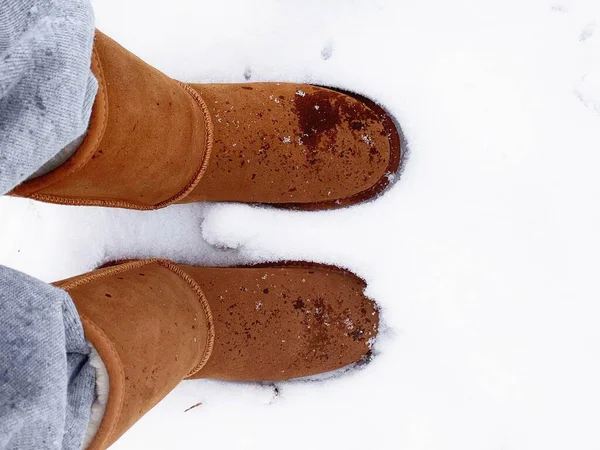 winter boots in the snow