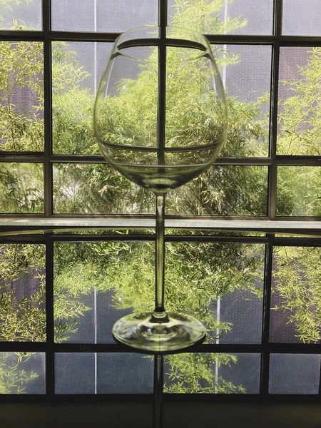 glass window with green leaves