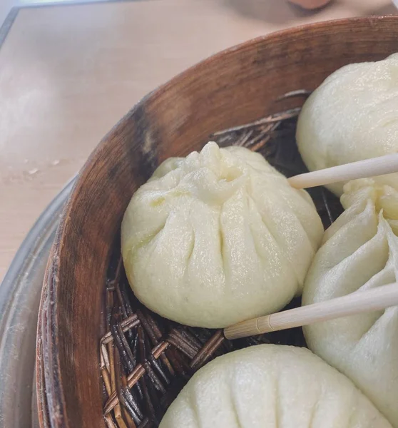 chinese steamed dumpling with sauce and egg