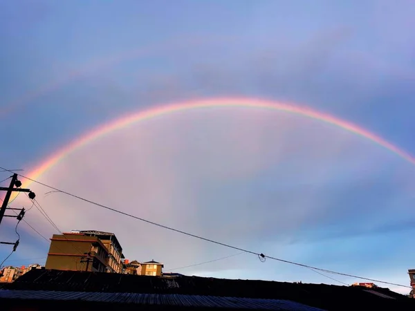 rainbow sky with clouds