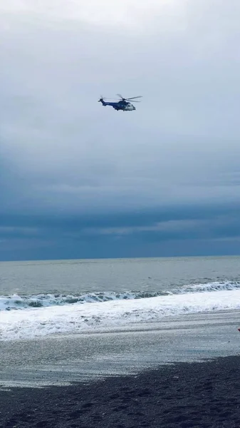 a beautiful view of a helicopter in the sea