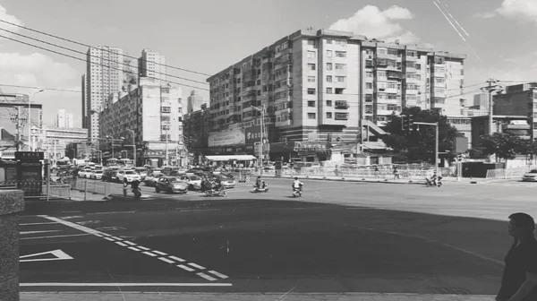 black and white photo of a modern building