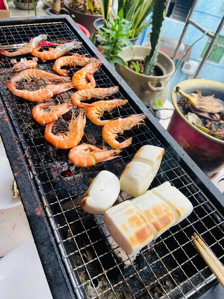 grilled squid and seafood on the grill