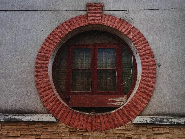 old wooden window with a red and white wall